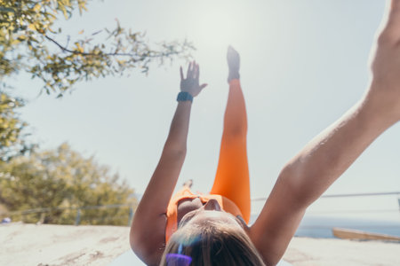 Woman Exercising Outdoors on a Sunny Day