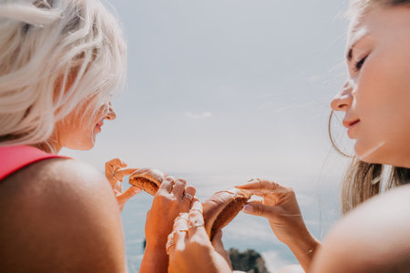 Two Women Sharing a Delicious Snack