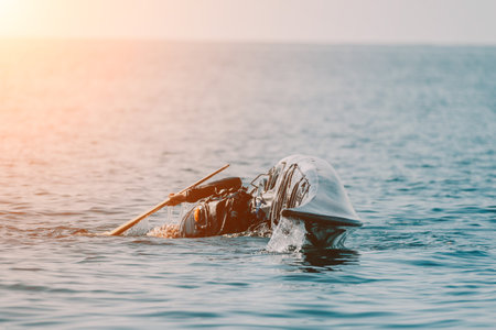 Kayaking Ocean Sunset Man kayaking in ocean at sunset.の写真素材