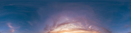 Seamless 360 HDR spherical panorama of sunset sky with vibrant pink Cirrus clouds. Full zenith or...
