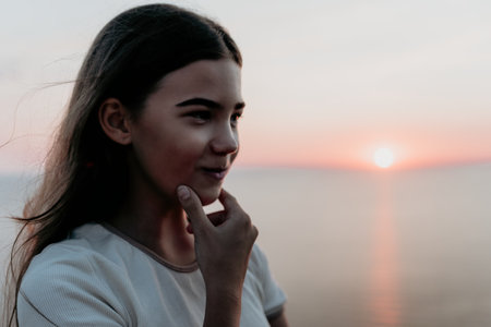Girl Contemplating the Sunset