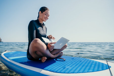 Woman Laptop Paddleboard Ocean Working Remotely