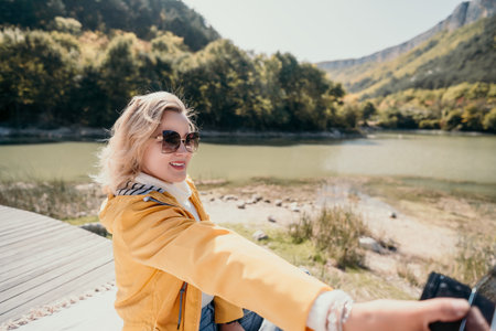 Young Woman Taking a Selfie in a Beautiful Natural Setting
