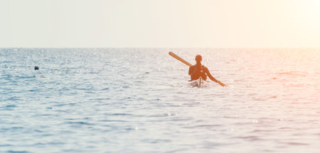 Man Paddleboarding Ocean Water Sportの写真素材