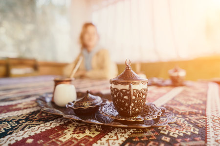 Traditional Turkish Coffee Set on a Colorful Rugの写真素材