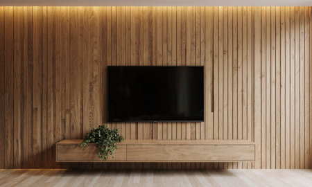 Natural Wood Texture - A honey wood-paneled wall holding a central TV, with a low console below decorated with greeneryの素材