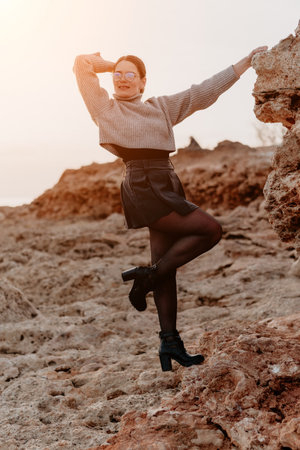 Woman Rock Formation Pose Desert Sunset Fashion Photographyの写真素材
