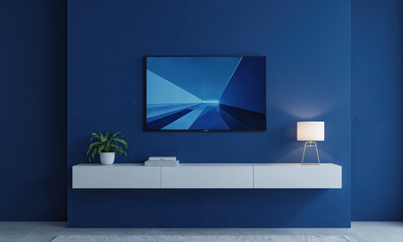 Navy Blue Wall - A large flat-screen mounted on a navy wall with a sleek white console below, flankedの素材