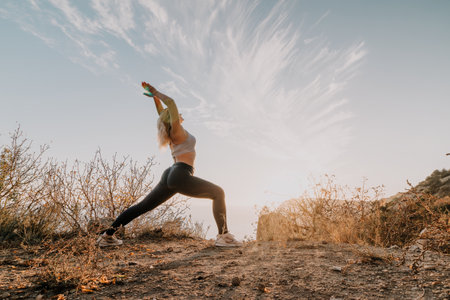 Yoga Woman Outdoors Mountain Pose Sunriseの写真素材
