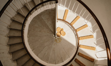 Savings-Spiral Stair top view spiral staircase where steps are circular graham crackers, syrup rail, light from above, whimsical depthの素材