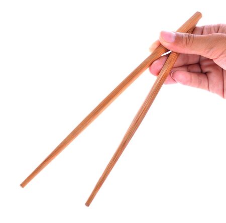 Wooden pairs of chopsticks on white backgroundの写真素材