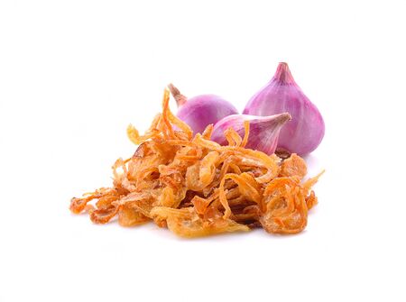 Fried onions and onions on a white background.の写真素材