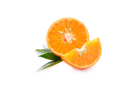 orange and leaves isolated on a white background