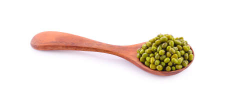 Mung bean in a spoon isolated on a white backgroundの写真素材