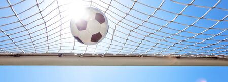 Traditional soccer game with a leather ballの写真素材