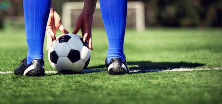 Traditional soccer game with a leather ballの写真素材