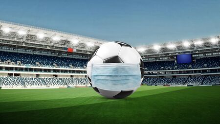 Euro soccer cancellation event concept. Ball with coronavirus maskの写真素材