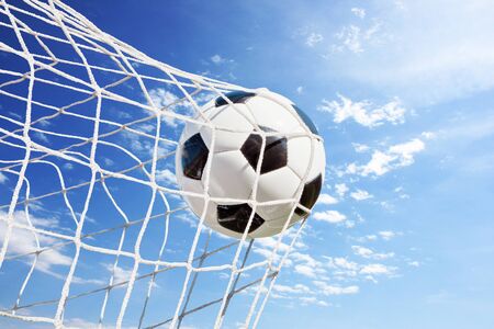 Traditional soccer game with a leather ballの写真素材