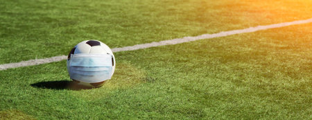 Euro soccer cancellation event concept. Ball with coronavirus maskの写真素材