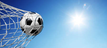 Traditional soccer game with a leather ballの写真素材