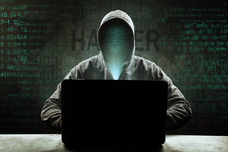 Hacker prints a code on a laptop keyboard to break into a cyberspace