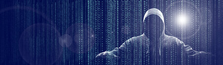 Hacker prints a code on a laptop keyboard to break into a cyberspace