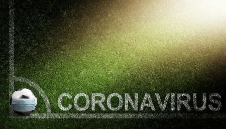 Euro soccer cancellation event concept. Ball with coronavirus maskの写真素材