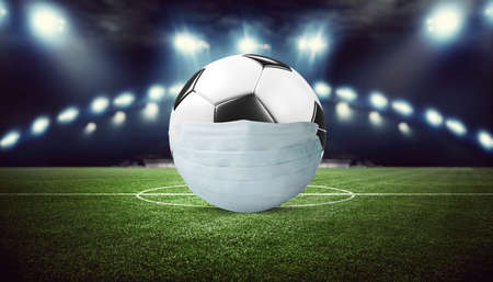 Euro soccer cancellation event concept. Ball with coronavirus maskの写真素材