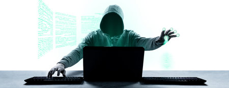 Hacker prints a code on a laptop keyboard to break into a cyberspace