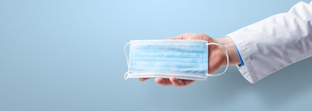 Typical surgical mask to cover mouth, nose. Protection concept, against coronavirus.の写真素材