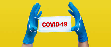 Typical surgical mask to cover mouth, nose. Protection concept, against coronavirus.の写真素材