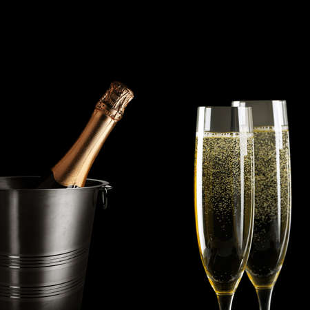 Glasses of champagne with splash, celebration theme conceptの写真素材