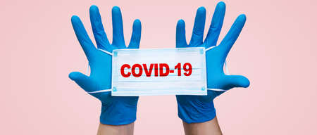 Typical surgical mask to cover mouth, nose. Protection concept, against coronavirus.の写真素材