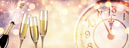 Glasses of champagne with splash, celebration theme concept