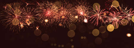 Colorful firework with bokeh background. New Year celebration, Abstract holiday backgroundの写真素材