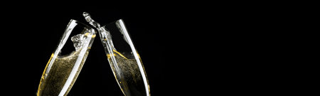 Glasses of champagne with splash, celebration theme conceptの写真素材