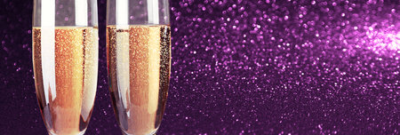 Glasses of champagne with splash, celebration theme conceptの写真素材