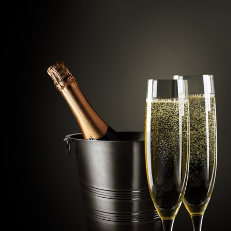 Glasses of champagne with splash, celebration theme conceptの写真素材