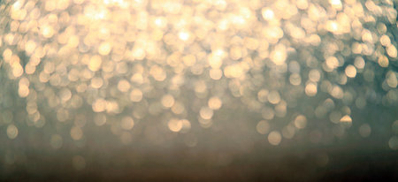 Abstract Christmas twinkled bright bokeh defocused backgroundの写真素材