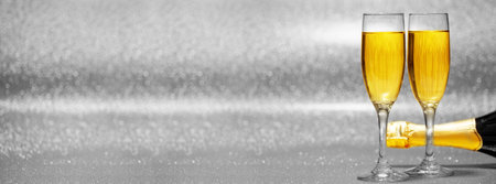 Glasses of champagne with splash, celebration theme conceptの写真素材