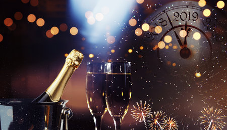 Glasses of champagne with splash, celebration theme conceptの写真素材