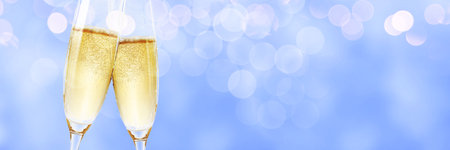 Glasses of champagne with splash, celebration theme conceptの写真素材