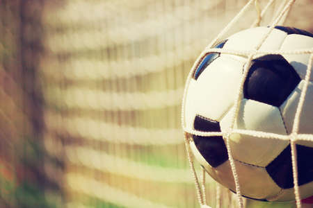 Traditional soccer game with a leather ballの写真素材