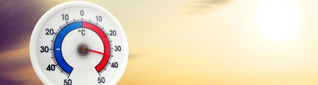 Mercury thermometer. Summer heat or global warming climate change concept.