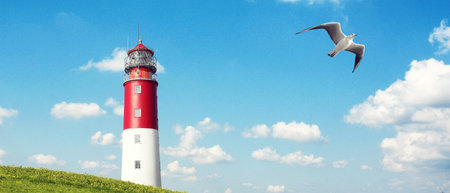 Beautiful summer seascape with lighthouse and sky