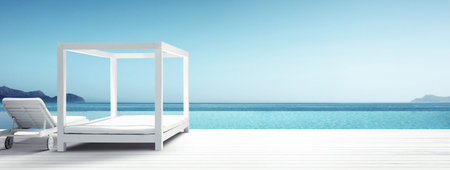 Wooden deck chairs on sandy beach near sea. Holiday background.