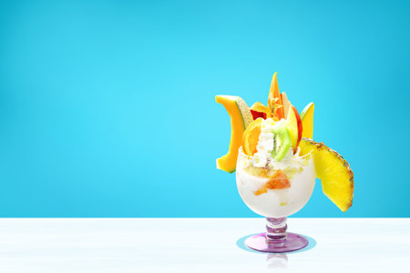 Sweet dessert concept. Frozen yogurt or soft ice cream.の写真素材