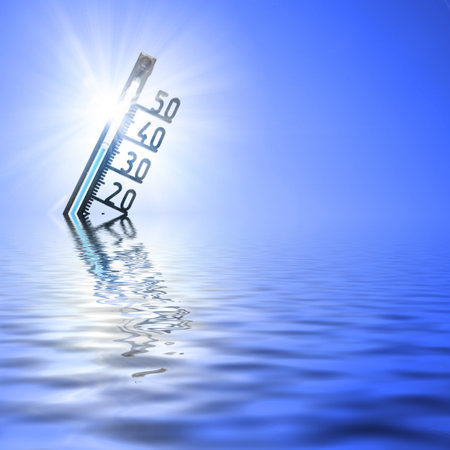 Mercury thermometer. Summer heat or global warming climate change concept.の写真素材