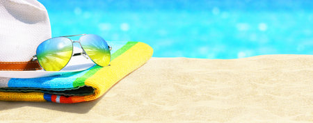 Summer vacation concept. Sunglasses with ocean beach and palms.
