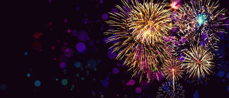 Colorful firework with bokeh background. New Year celebration, Abstract holiday backgroundの写真素材